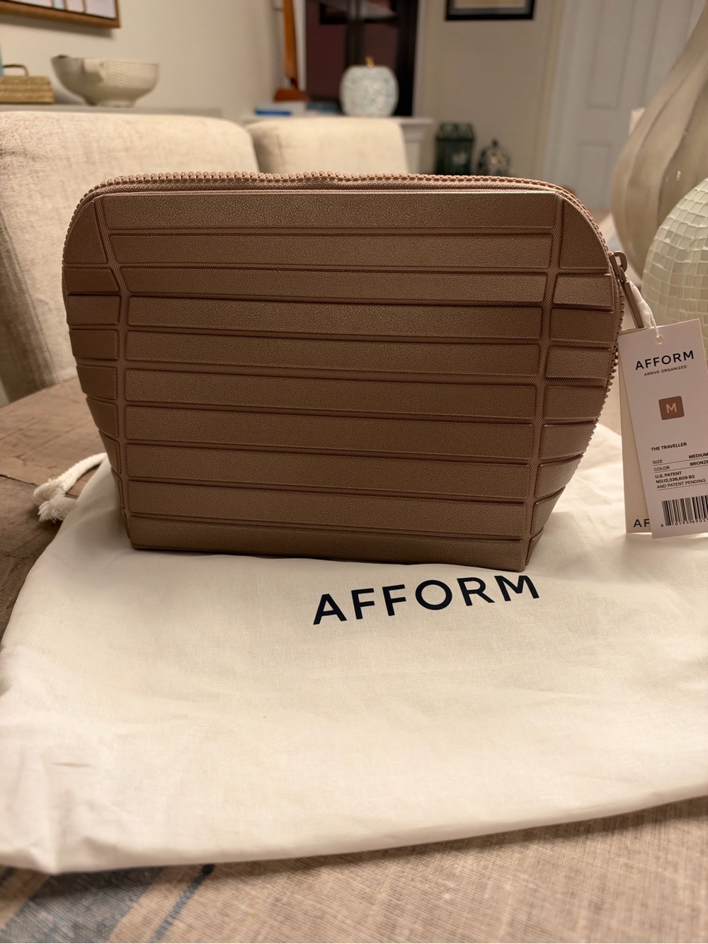 Afform/Parallel Medium Bronze Toiletry Bag NWT and dust bag.